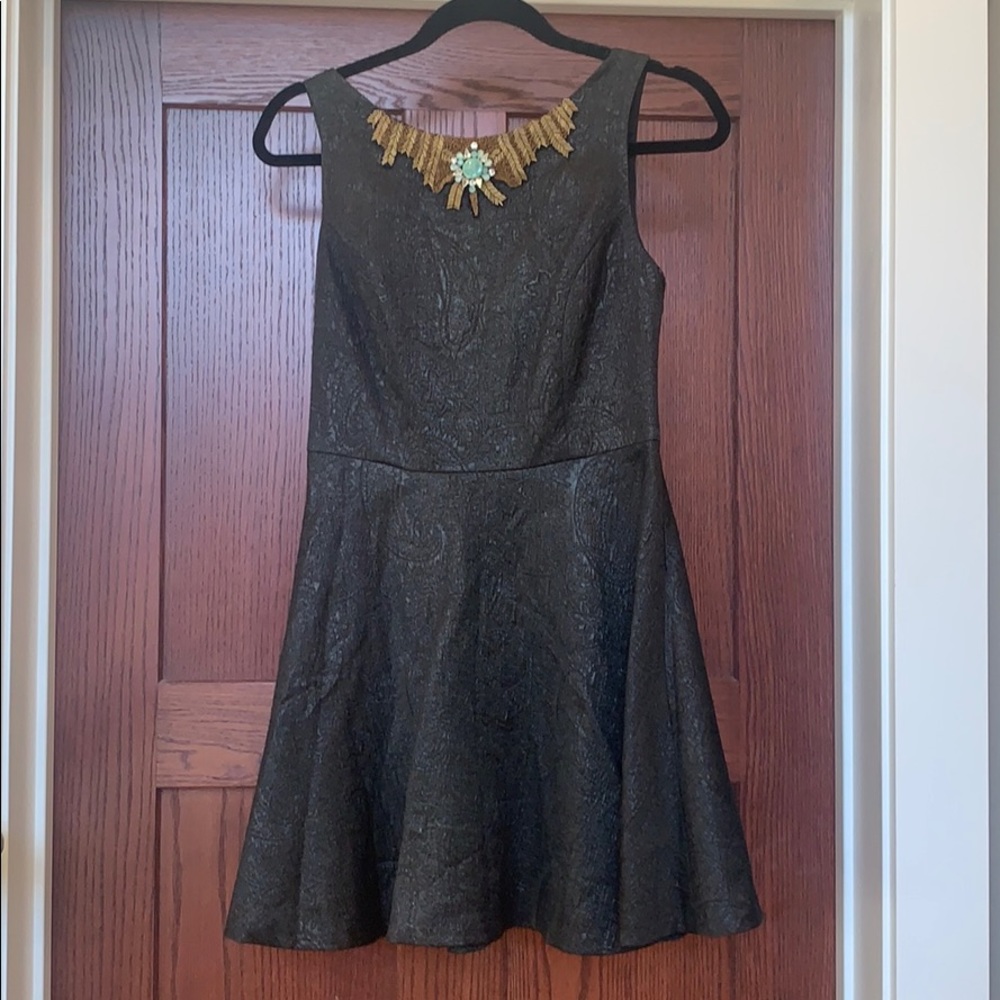 Black cocktail formal dress with beaded detail